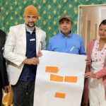 Teachers presenting their group work at the training