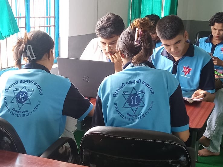 Sindhuli Multiple Campus (SMC) students engaged in group activities during course implementation
