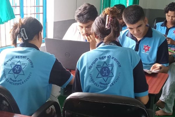 Sindhuli Multiple Campus (SMC) students engaged in group activities during course implementation